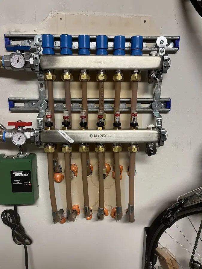 Plumber performing Water Heater Repair at a residential property in Scappoose